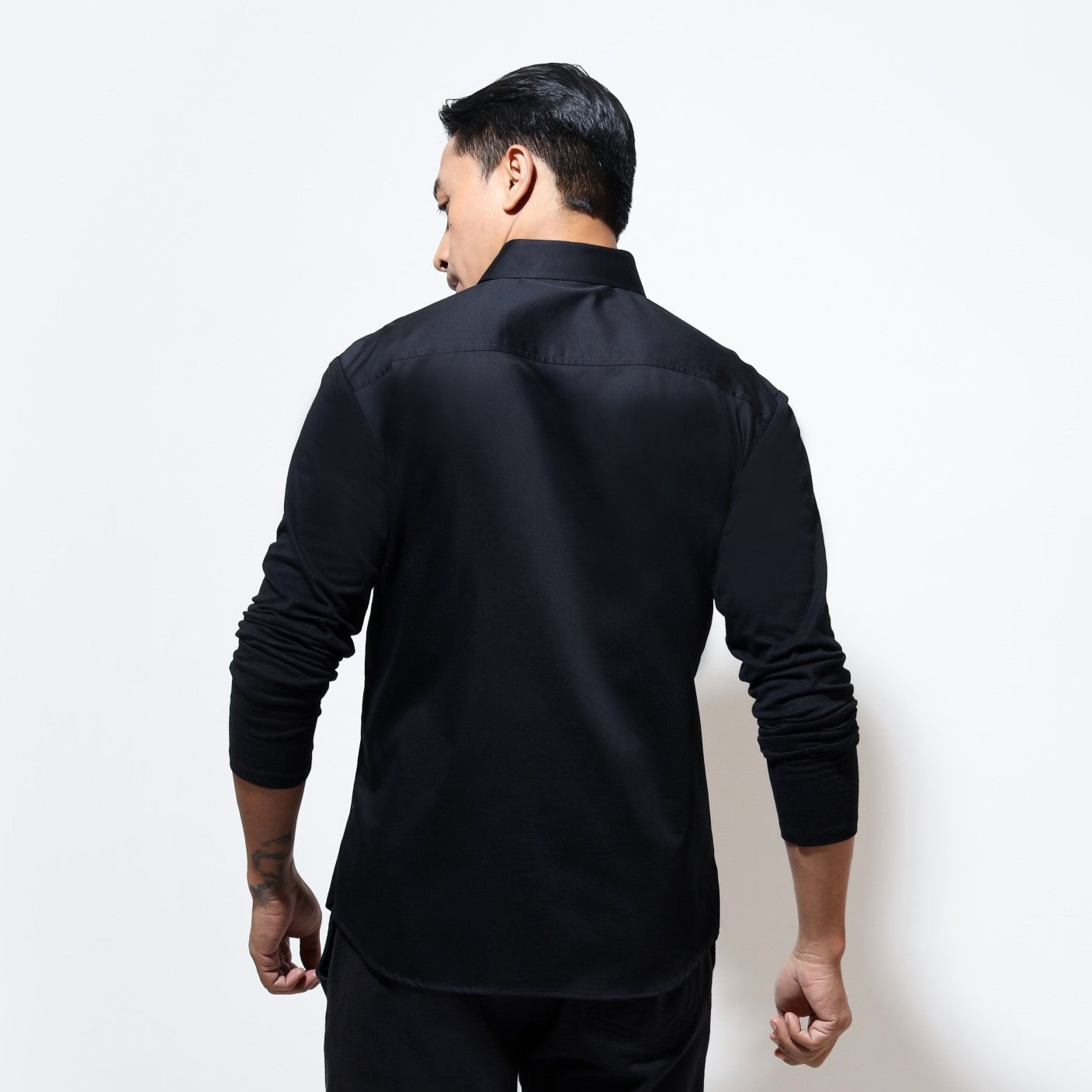 Long sleeve shirt with quilted bib yoke and jersey sleeves
