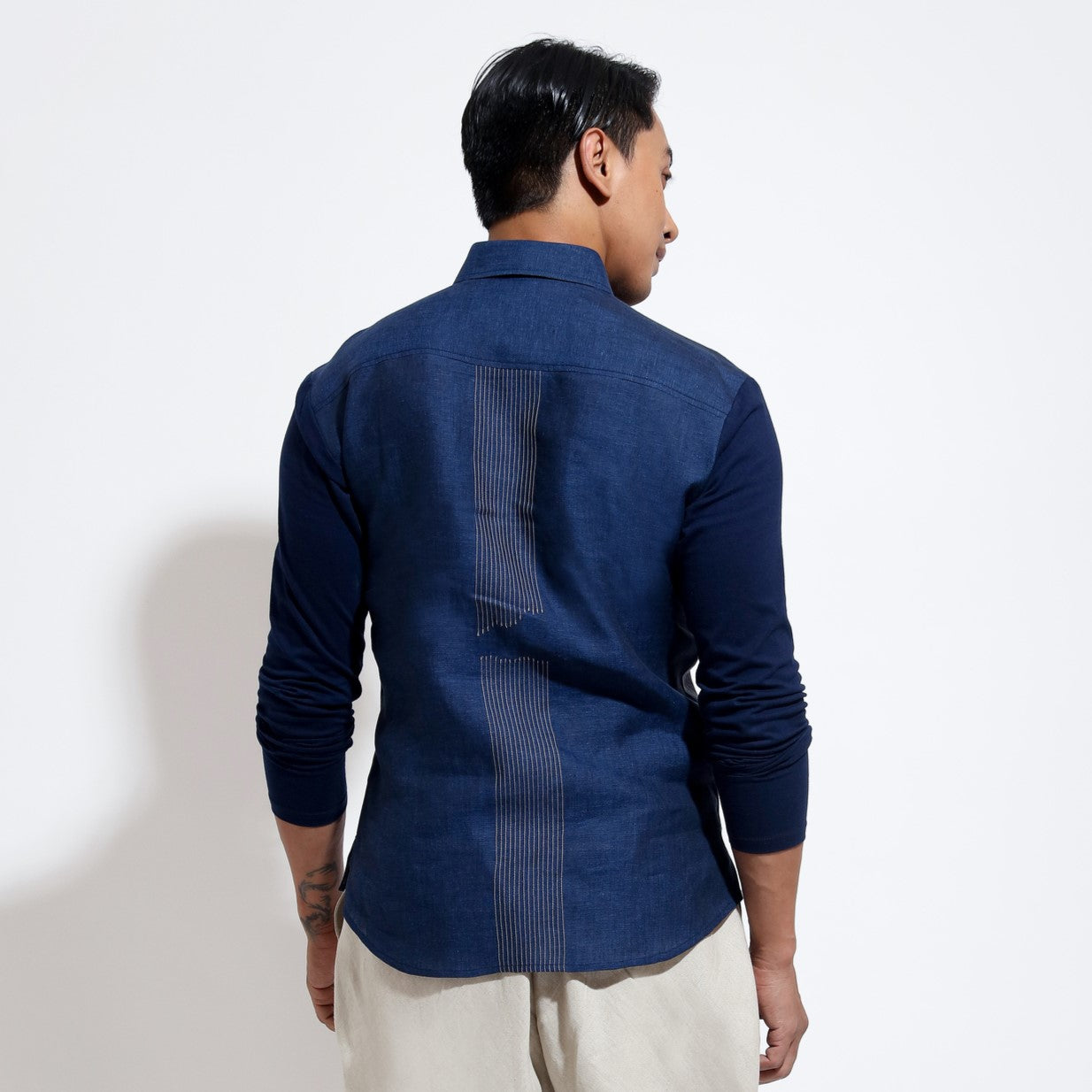 Long sleeve shirt with topstitch creating bird emb and jersey sleeves