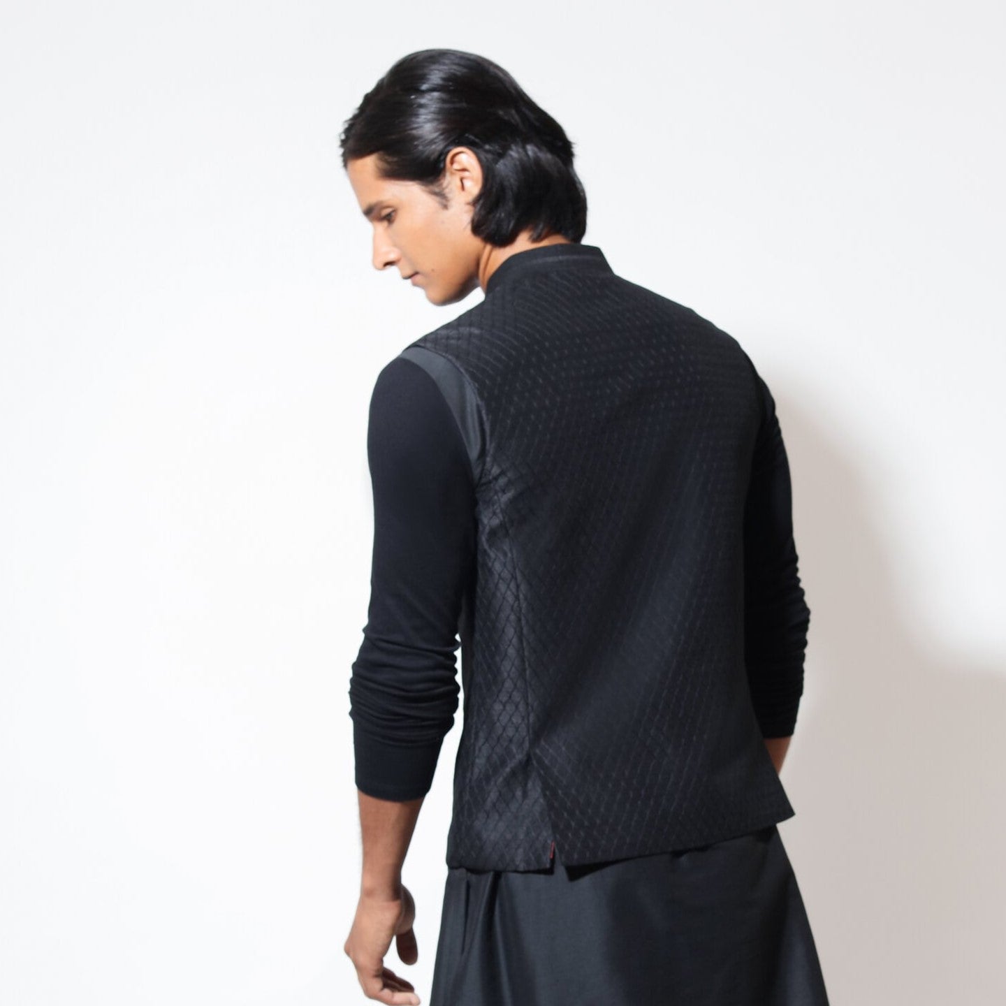 Sleeveless bandi with jaali embroidery and kalamkari buttons
