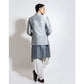 Bandhgala with motif embroidery layered over updown hem kurta and cowl pants