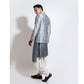 Bandhgala with motif embroidery layered over updown hem kurta and cowl pants