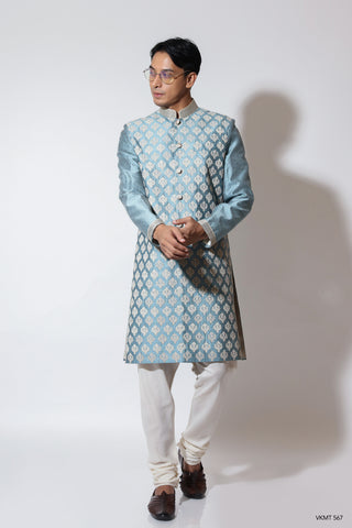 Motif embroidered sherwani layered over crop pants