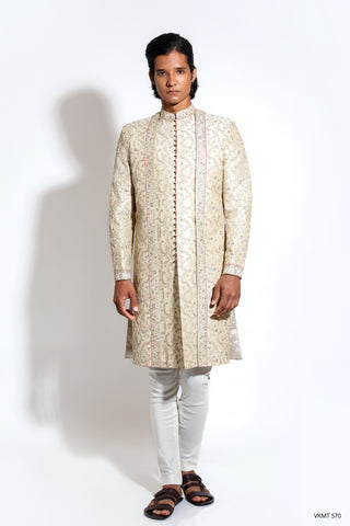 All over aari embroidered layered sherwani with contrast piping border detail layered over crop pants