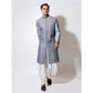 Sherwani textured with all over creeper emb with cowl pants