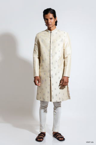 Scattered tonal embroidered sherwani with potli buttons layered over chudidar