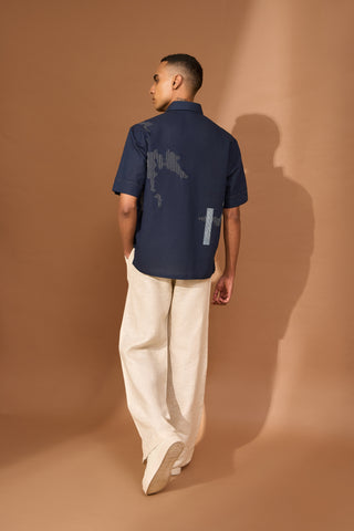 Boxy shirt in indigo with shatter embroidery & patch pocket in indigo stripe