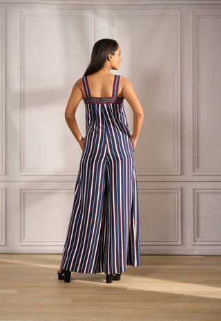 Jumpsuit in navy / crimson stripe with contrast piping