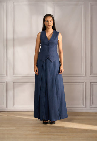 Waistcoat in indigo linen with topstitch texture paired with pleated pallazo  in indigo linen