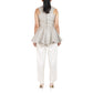 Embroidered peplum top in champagne