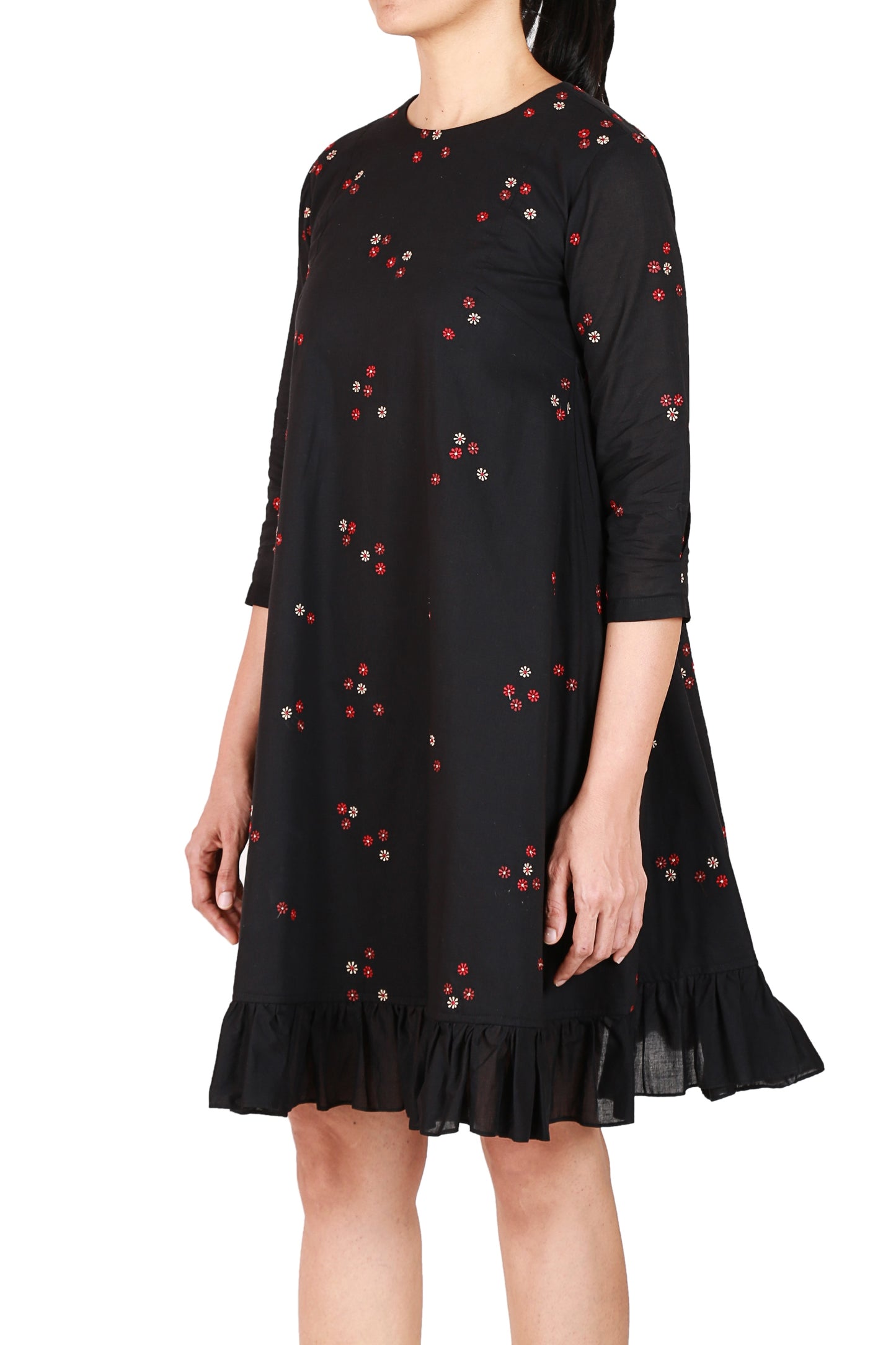 A line dress in cotton linen with floral embroidery