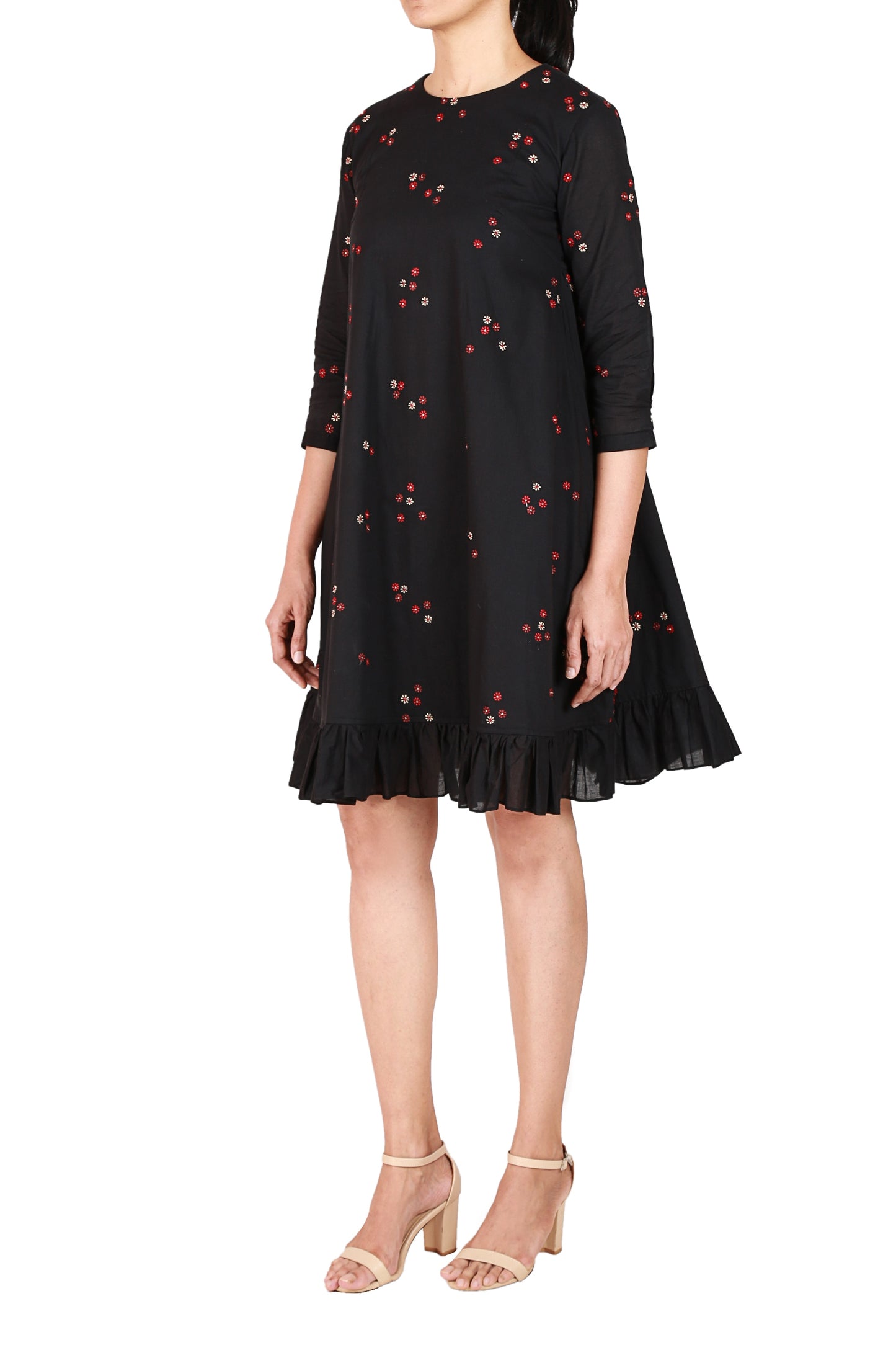 A line dress in cotton linen with floral embroidery